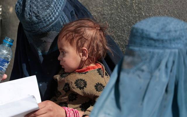 poor women in streets of kabul