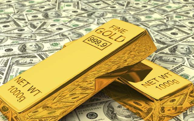 dollar and gold